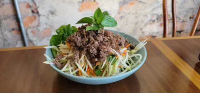 Green papaya salad with grilled lemon