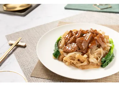 Rice Noodles with Vegetable Stalks and Beef