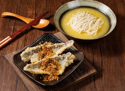 Snow cabbage and fresh fish soup with crispy fried yellow croaker noodles
